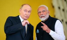 media/98/putinheadsdelhi_4749833t.jpg